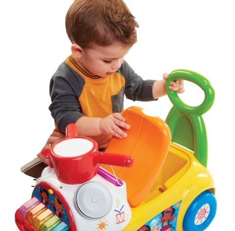 Fisher price jeździk muzyczna parada żółty